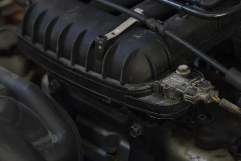 Car Engine Close-Up with Intake Manifold and Wiring Stock Photos