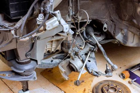 Car engine components exposed during repair at garage, showcasing detailed 스톡 사진