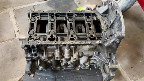 Car Engine Crankcase Exposed During Mechanical Inspection and Rebuild Process Stock Footage 339476782