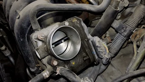 A car engine electronic throttle body assembly connected to manifold. 스톡 동영상 339491510