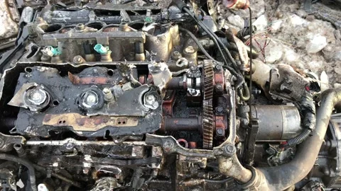 Car Engine in Junk Yard Sunlit 動画素材 98430279