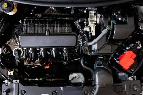 Car engine  motor  concept Close up detail of new Car engine part Stock Photos