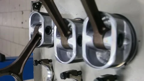 Car engine pistons on the table Stock Footage 150266706