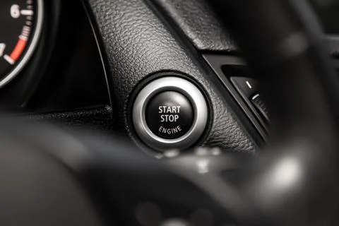 Car engine push start stop button ignition remote starter. Car dashboard:  bl Stock Photos