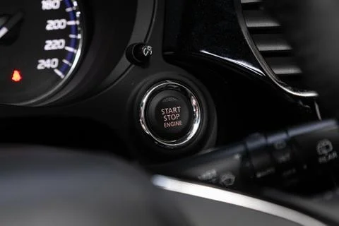 Car engine push start stop button ignition remote starter. Car dashboard Stock Photos