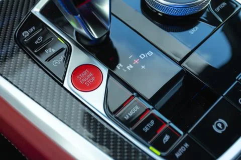 Car engine push start stop button ignition remote starter. Car dashboard:   r Stock Photos