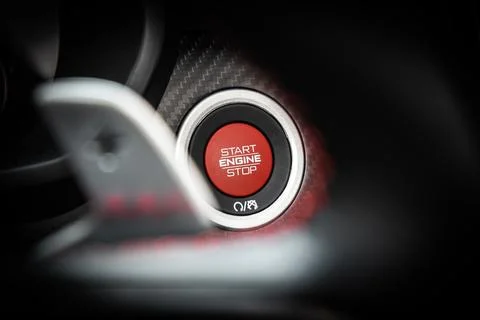 Car engine push start stop button ignition remote starter. Car dashboard Stock Photos