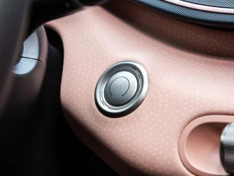 Car engine push start stop button ignition remote starter. Car dashboard Foto stock