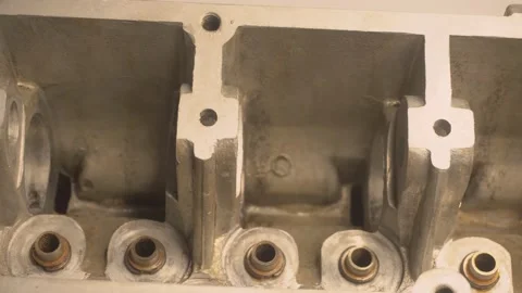 Car engine repair in factory. Engine cylinder head and block repair process Stock Footage 190618593
