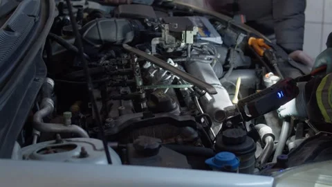 Car Engine Repair in Workshop – Mechanic Working with Tools Stock Footage 306502076