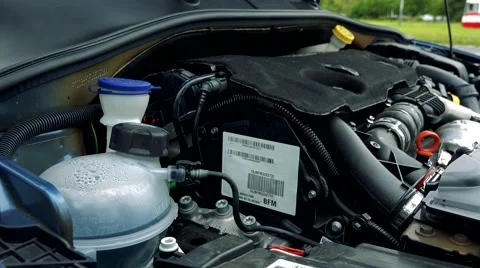 Car engine - road - closeup Stock Footage
