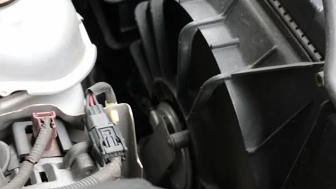 Car engine running while air conditioner vent blowing Stock Footage 322896690