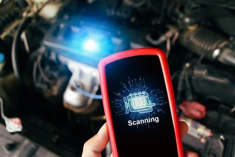 Car engine scanning with wireless technical tool, OBD2 scanner tool Stock Photos