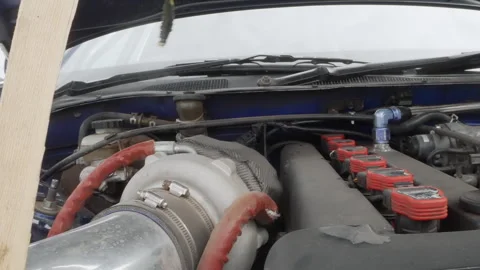 Car engine showcase. Streetready vehicle displaying turbocharged engine Stock Footage 341979084