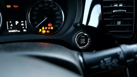 Car engine start button and front panel in a modern car Foto stock