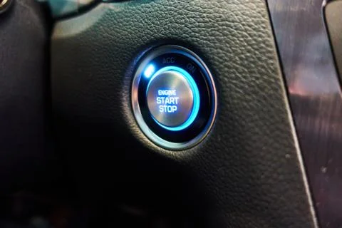 Car engine start button with blue backlight 写真素材