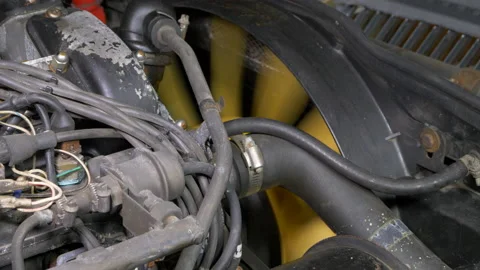 Car engine starting with cooling fan turning. Video stock 135308800