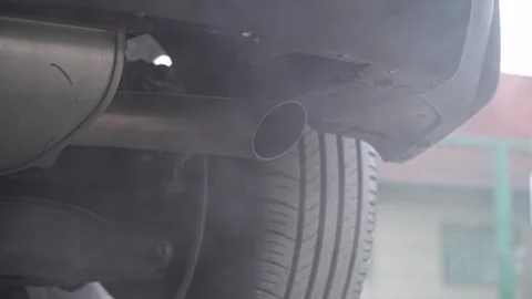 Car engine starts, a lot of smoke comes from the exhaust pipe, sound of the.. Stock Footage 321374492