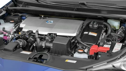 Car engine in studio close up Blue Crush Metallic 2016 Toyota Prius Four Touring Video stock 159869840