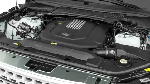 Car engine in studio close up Fuji White 2017 Land Rover Range Rover HSE Stock Footage 159931042