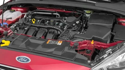 Car engine in studio close up Ruby Red Tinted Clearcoat 2016 Ford Focus Titanium Stock Footage 159865988