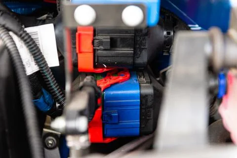 Car engine system with red components and cables Stock Photos