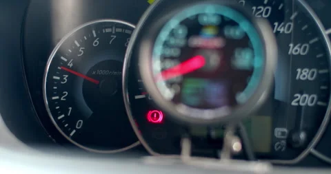 Car engine tachometer gauge.The gauge shows that the engine is running. Stock Footage 310912128