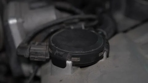 Car engine valve cover PCV valve diaphragm oil separator cap. Stock Footage 344596015