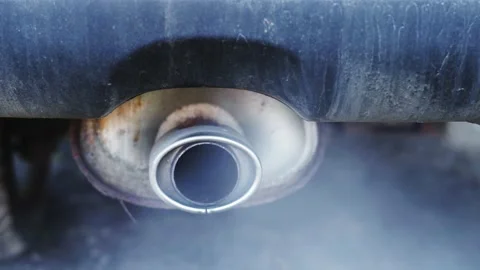 Car exhaust during engine start in cold weather Stock Footage 154227524