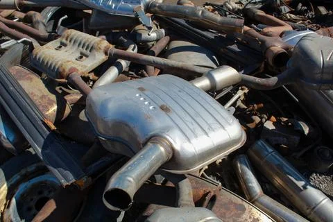 Car exhaust elements, environmental pollution, industrial waste. Stock Photos