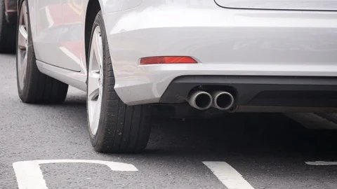 Car exhaust pipe, car pulls away Stock Footage 98181861