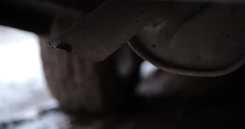 Car Exhaust Pipe Tip Close Up Emitting Vapor Water Drops Fuel Combustion Cold Stock Footage 321810449
