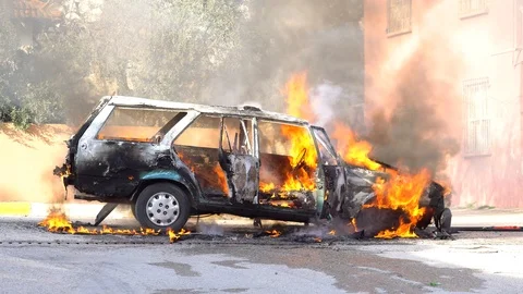 Car explosion. car on fire. burning car crash accident. firefighter fireman. Stock Footage 86576451