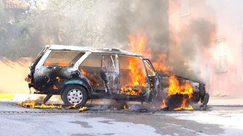 Car explosion. car on fire. burning car crash accident. firefighter fireman. Stock Footage 86578801