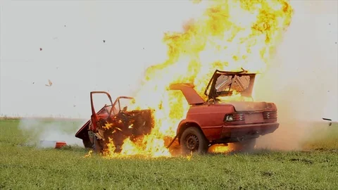 Car Explosion In The Field. Stock Footage 98695244