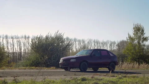 Car Explosion On The Road During The Daytime. Stock Footage 98698156