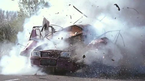 Car Explosion On The Road In Slow Motion. Car burning. Video stock 98638322