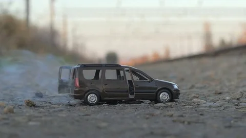 Car explosion, slow-mo. smoke, toy car Stock Footage 82798078