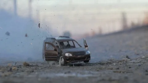 Car explosion, slow-mo. smoke, toy car Stock Footage 82798079