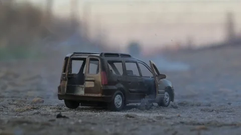 Car explosion, slow-mo. smoke, toy car Stock Footage 82798100
