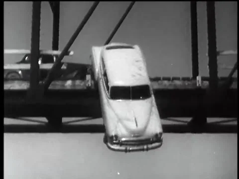 Car falling from bridge into river, 1960s Stock Footage 61766790