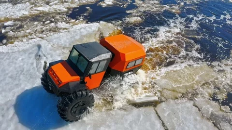 The car is falling through the ice. Tundra Tackling Titan. Roaring Across the Stock Footage 262907960