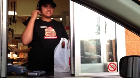 Car in fast food drive through for picking up order Stock Footage 45254110