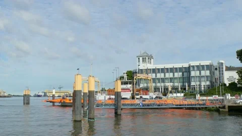 Car ferry from Vegesack to Lemwerder on the River Weser with Hotel Strandlust Stock Footage 135031255