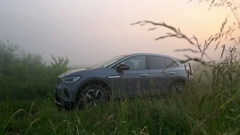 Car in the field at dawn time lapse Stock Footage 206143002