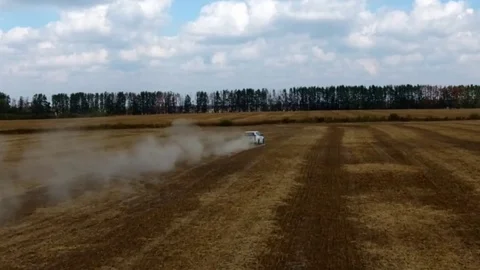 Car, field, dust Video stock 75980732