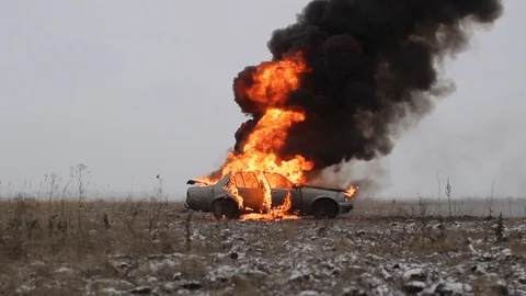 Car On Fire, Burning Car In The Field Video stock 101529952
