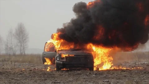 Car On Fire, Burning Car In The Field, Front View Stock Footage 101531450