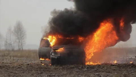 Car On Fire, Burning Car In The Field, Front View Stock Footage 101531619