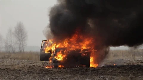Car On Fire, Burning Car In The Field, Front View Stock Footage 101531978